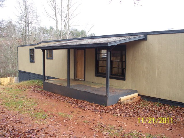 mobile home has been remodeled with a rustic touch!